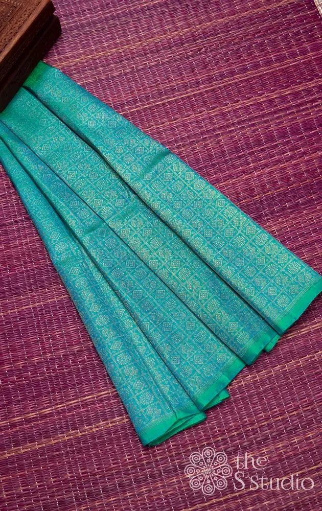 Sea blue kanchi silk blouse material with mayil chakaram motifs